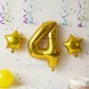 Golden number 4 foil balloon (16 inch) with two golden star balloons (10 inch) for party decoration
