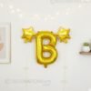 Golden foil balloon combo featuring letter 'B' (16 inch) and two star-shaped balloons (9 inch) for party decoration