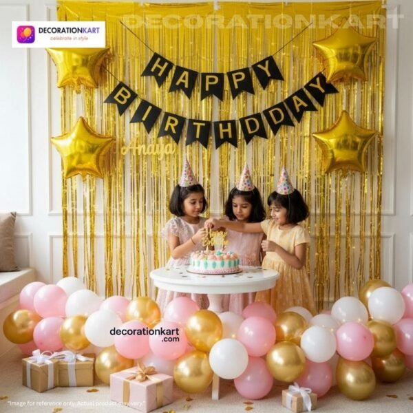 Birthday party setup with DECORATIONkart’s 66 pcs decoration kit featuring a black cardstock “Happy Birthday” banner, golden fringe curtains, metallic balloons in golden, pink, and white, golden star foils, and DIY accessories.