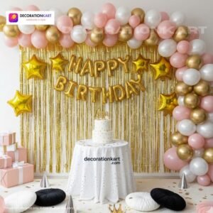 Indian children celebrating a birthday party with DECORATIONkart’s 66 pcs decoration combo set, featuring a golden foil “Happy Birthday” banner, golden fringe curtains, metallic balloons in gold, pink, and white, golden star foil balloons, and DIY accessories.