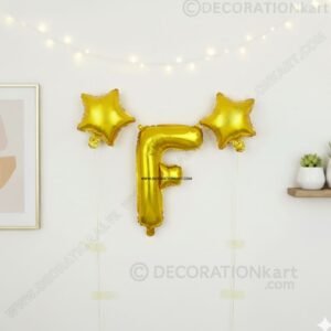 Golden foil balloon combo featuring letter 'F' (16 inch) and two star-shaped balloons (9 inch) for party decoration
