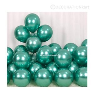 Glossy green chrome latex balloons floating in a vibrant party setup with floral and festive accents.