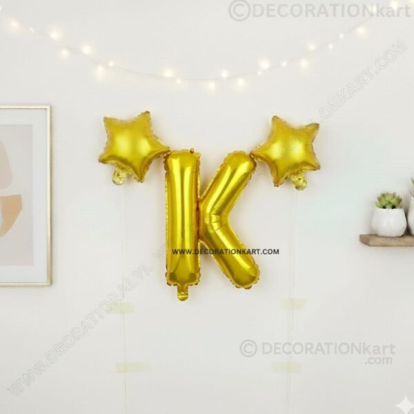 Golden foil balloon combo featuring letter 'K' (16 inch) and two star-shaped balloons (9 inch) for party decoration