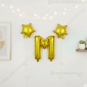 Golden foil balloon combo featuring letter 'M' (16 inch) and two star-shaped balloons (9 inch) for party decoration