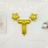Golden foil balloon combo featuring letter 'T' (16 inch) and two star-shaped balloons (9 inch) for party decoration