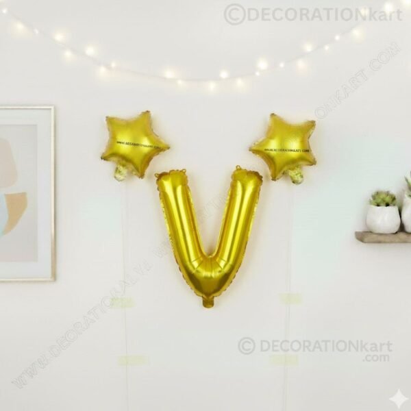 Golden foil balloon combo featuring letter 'V' (16 inch) and two star-shaped balloons (9 inch) for party decoration