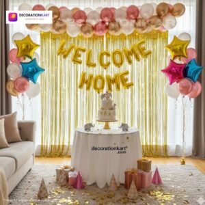 Welcome home party setup with DECORATIONkart’s 60 pcs decoration kit featuring a golden foil “WELCOME HOME” banner, golden fringe curtains, metallic balloons in golden, white, and pink, star foil balloons, and DIY accessories.