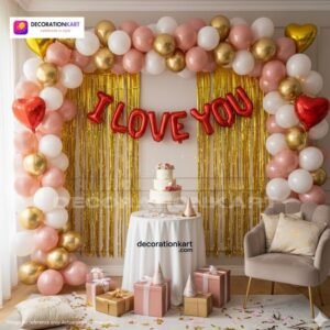 Romantic couple party setup with DECORATIONkart’s 61 pcs decoration kit featuring a red foil “I LOVE YOU” banner, golden fringe curtains, metallic balloons in pink, golden, and white, heart foil balloons, and DIY accessories.