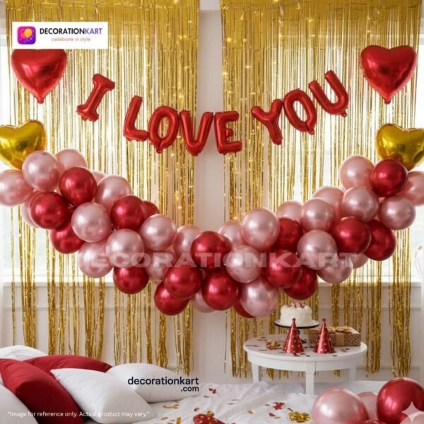 Alt Text: Romantic couple party setup with DECORATIONkart’s 61 pcs decoration kit featuring a red foil “I LOVE YOU” banner, golden fringe curtains, metallic balloons in pink, red, and white, heart foil balloons, and DIY accessories.