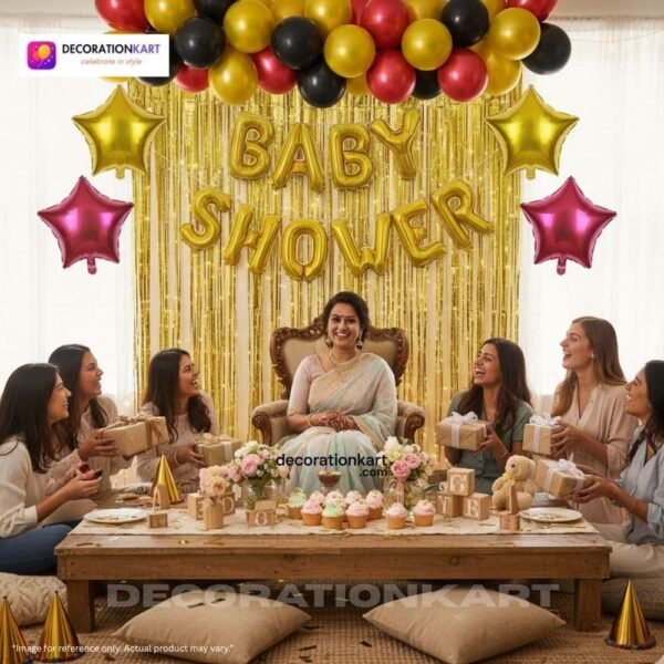 Baby shower party setup with DECORATIONkart’s 63 pcs decoration kit featuring a golden foil “Baby Shower” banner, golden fringe curtains, metallic balloons in black, yellow, and red, multicolor star foils, and DIY accessories.