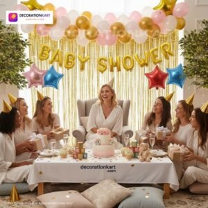 Baby shower party setup with DECORATIONkart’s 63 pcs decoration kit featuring a golden foil “Baby Shower” banner, golden fringe curtains, metallic balloons in golden, pink, and white, multicolor star foils, and DIY accessories.