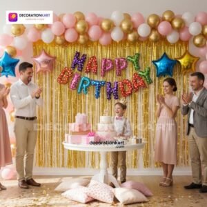 Indian children celebrating a birthday party with DECORATIONkart’s 66 pcs decoration combo set, featuring a multicolor foil “Happy Birthday” banner, golden fringe curtains, metallic balloons in gold, white, and pink, colorful star foil balloons, and DIY accessories.