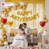 Alt Text: Anniversary party setup with DECORATIONkart’s 69 pcs decoration kit featuring a golden foil “Happy Anniversary” banner, golden fringe curtains, metallic balloons in golden, yellow, and white, golden and red heart foils, and DIY accessories.