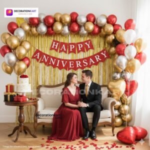 Anniversary party setup with DECORATIONkart’s 69 pcs decoration kit featuring a red cardstock “Happy Anniversary” banner, golden fringe curtains, metallic balloons in golden, red, and white, golden and red heart foils, and DIY accessories.